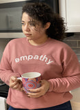 "empathy" Sponge Fleece Raglan Crewneck Sweatshirt