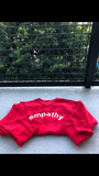 "empathy" Sponge Fleece Raglan Crewneck Sweatshirt